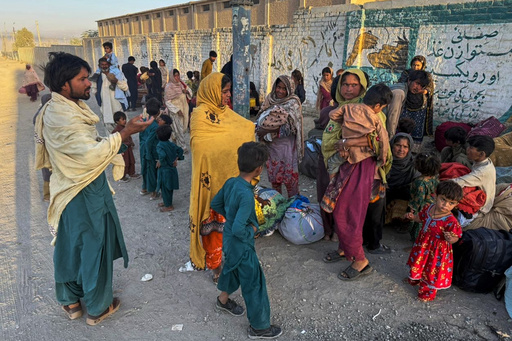 Local residents, who fled their homes following border clashes between Pakistan and Afghan forces, wait for transportation in Chaman, a town on the Pakistan side of the border, Wednesday, Oct. 15, 2025. (AP Photo/H. Achakzai) Local residents, who fled their homes following border clashes between Pakistan and Afghan forces, wait for transportation in Chaman, a town on the Pakistan side of the border, Wednesday, Oct. 15, 2025. (AP Photo/H. Achakzai)