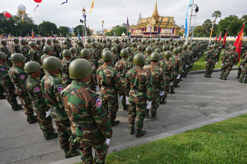 FILE - Cambodian military members participate together with government civil servants in the country's 70th Independence Day, in Phnom Penh, Cambodia, Thursday, Nov. 9, 2023. (AP Photo/Heng Sinith, file)
