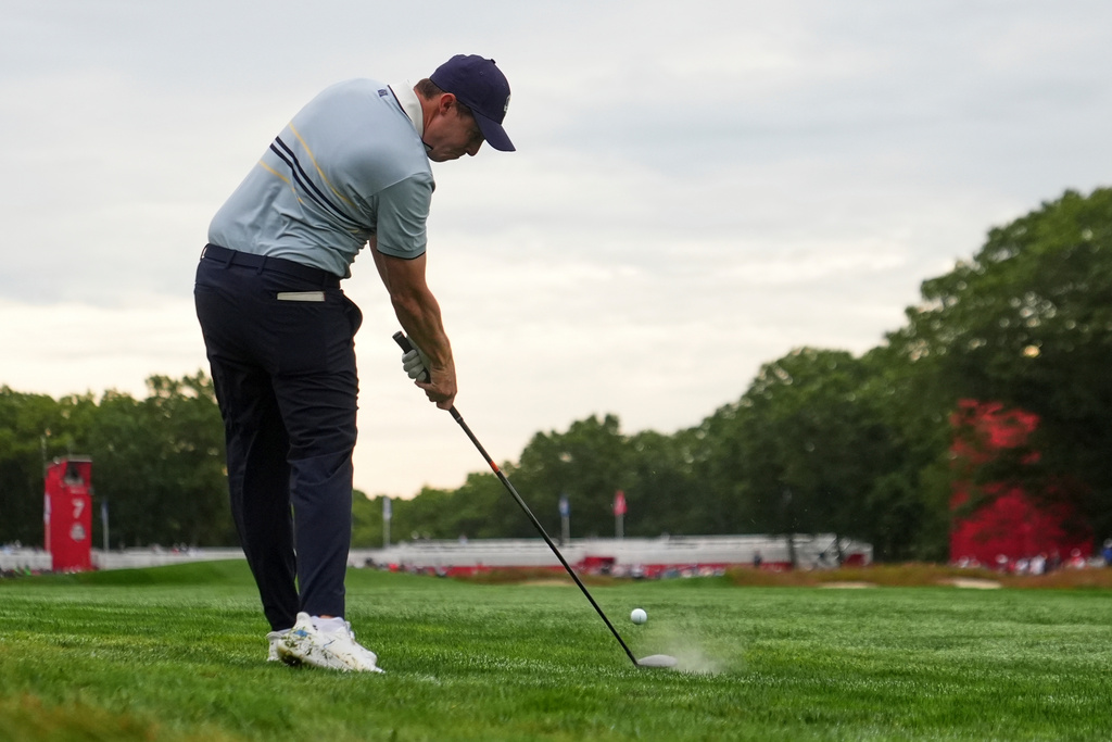 Europe's Matthew Fitzpatrick hits from the rough on the seventh hole at Bethpage Black golf course during the Ryder Cup golf tournament, Friday, Sept. 26, 2025, in Farmingdale, N.Y. (AP Photo/Lindsey Wasson)