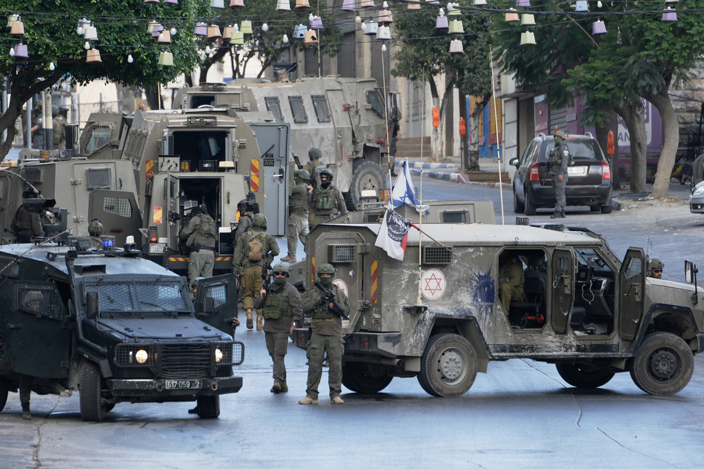 Israeli soldiers operate in the West Bank Palestinians city of Nablus, Sunday, July 26, 2026. (AP Photo/Majdi Mohammad)