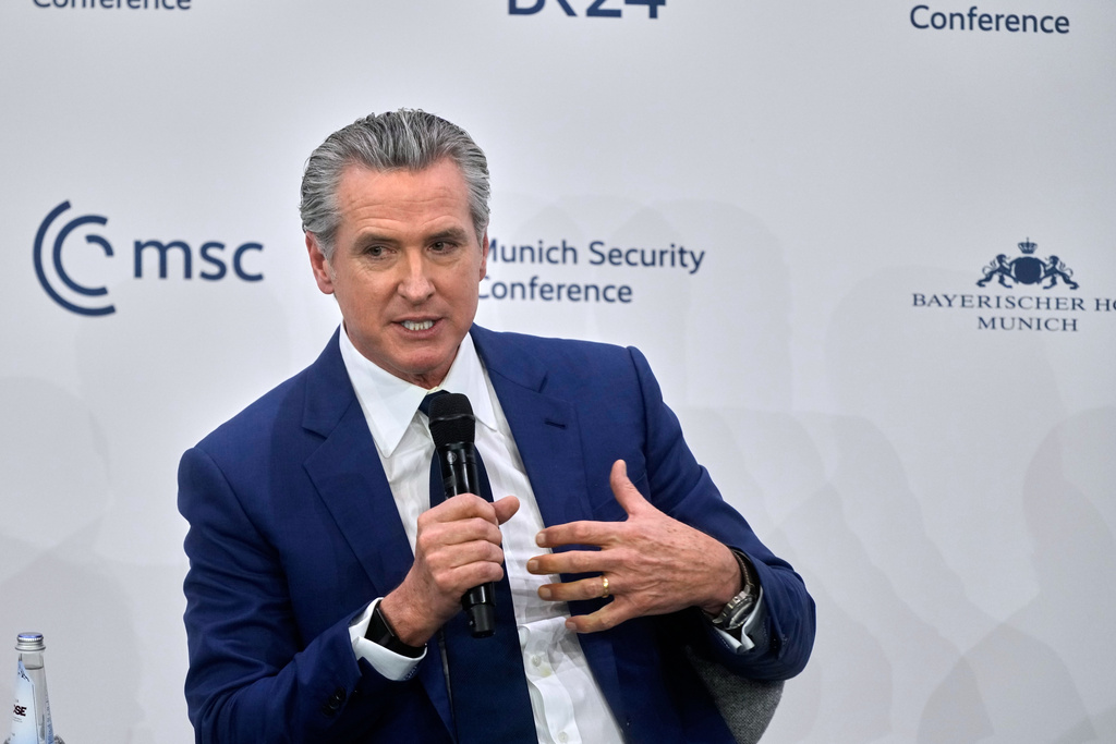 Governor of the State of California, Gavin Newsom speaks during a session at the Munich Security Conference in Munich, Germany, Friday, Feb. 13, 2026. (AP Photo/Michael Probst)