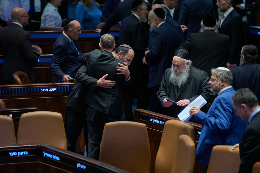 Israeli lawmakers attend a parliamentary session in Jerusalem for a vote on a bill that would change the authority and responsibilities of the attorney general Wednesday, July 15, 2026, in Jerusalem. (AP Photo/Ohad Zwigenberg)
