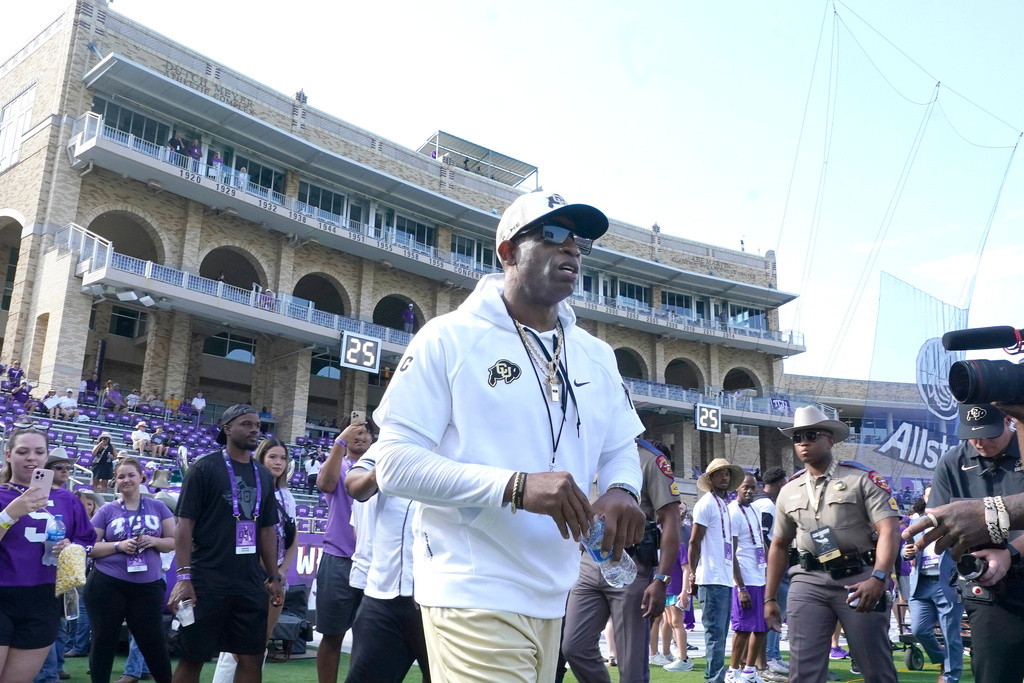 FILE - Colorado head coach Deion Sanders walks the field before an NCAA college football game against TCU Saturday, Sept. 2, 2023, in Fort Worth, Texas. (AP Photo/LM Otero,File)