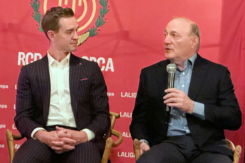Mallorca controlling owner Andy Kohlberg, right, and former U.S. soccer national team star Stuart Holden, left, a Mallorca co-owner, speak Tuesday, Oct. 14, 2025, at Maxwell Social in New York to promote the club’s marketing efforts in the United States. (AP Photo/Ronald Blum)