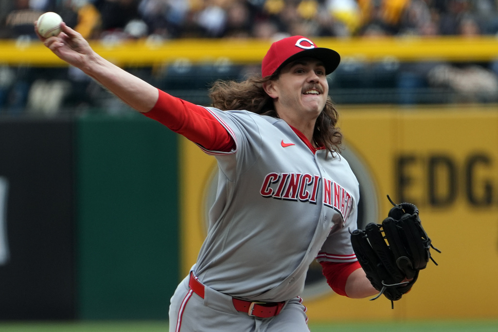 Cincinnati Reds pitcher Rhett Lowder delivers a pitch against the Pittsburgh Pirates in the first inning of a baseball game in Pittsburgh, Saturday, May 2, 2026. (AP Photo/Tom E. Puskar)