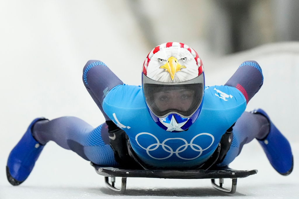 FILE - Katie Uhlaender, of United States, finishes the women's skeleton run 2 at the 2022 Winter Olympics, Friday, Feb. 11, 2022, in the Yanqing district of Beijing. (AP Photo/Mark Schiefelbein, File)