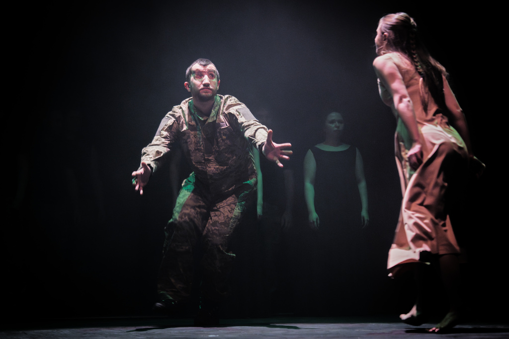 Andrii Onopriienko, who lost his eyesight in combat during Russia's full-scale invasion in Ukraine, performs during the premiere of an adaptation of Ivan Kotliarevskyi’s “Eneida,” a Ukrainian reimagining of Virgil’s “Aeneid,” in Kyiv, Ukraine, Thursday, Feb. 19, 2026. (AP Photo/Efrem Lukatsky)
