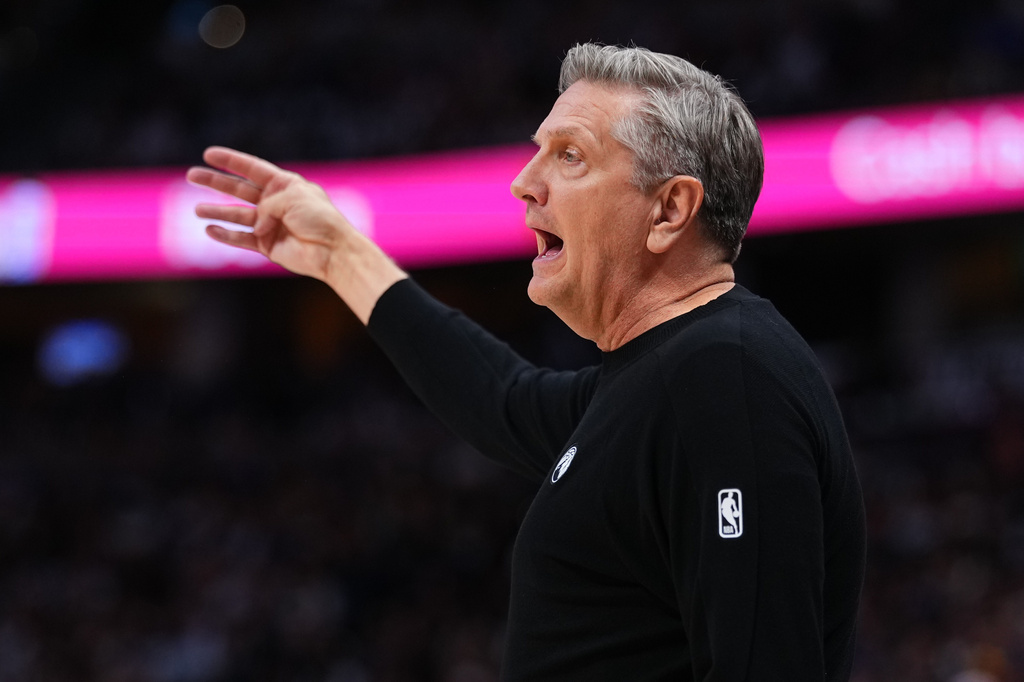 Minnesota Timberwolves head coach Chris Finch reacts during the first half in Game 2 of a first-round NBA playoffs basketball series against the Denver Nuggets, Monday, April 20, 2026, in Denver. (AP Photo/Jack Dempsey)
