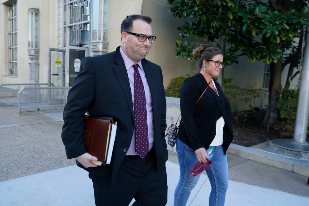 FILE - Former Los Angeles Angels employee Eric Kay, left, walks out of a federal court building where he is on trial for federal drug distribution and conspiracy charges in Fort Worth, Texas, Feb. 15, 2022. (AP Photo/LM Otero, File)