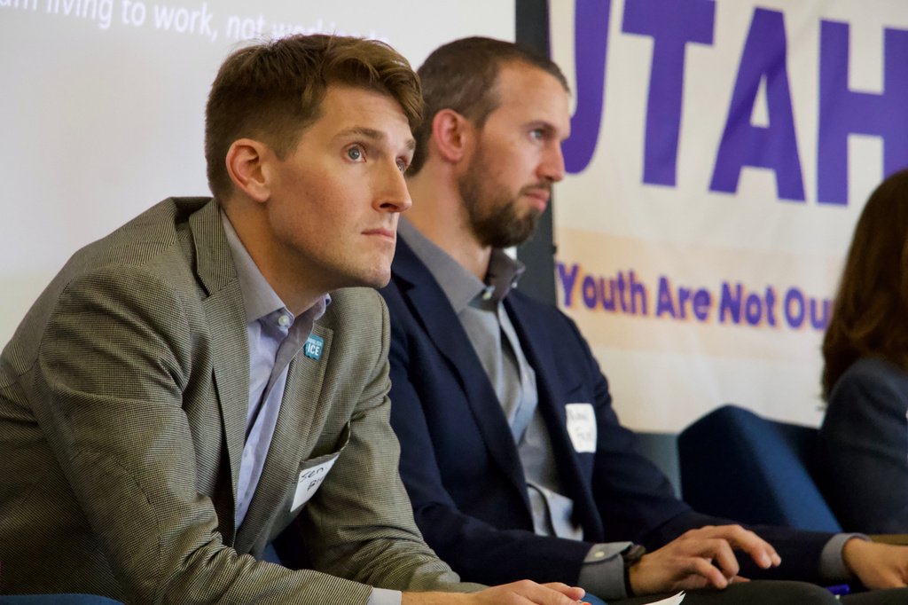FILE - Utah state Sen. Nate Blouin, left, and tax attorney Michael Farrell speak on a panel of candidates running to represent Utah's new Democratic-leaning congressional district, March 21, 2026, in Taylorsville, Utah. (AP Photo/Hannah Schoenbaum, File)