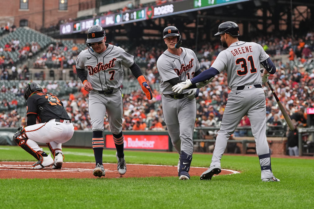 Detroit Tigers Dillon Dingler, second from right, celebrates with Kevin McGonigle (7) and Riley Greene (31) after hitting a two-run home run against the Baltimore Orioles during the first inning in the second baseball game of a doubleheader, Sunday, May 24, 2026, in Baltimore. (AP Photo/Stephanie Scarbrough)