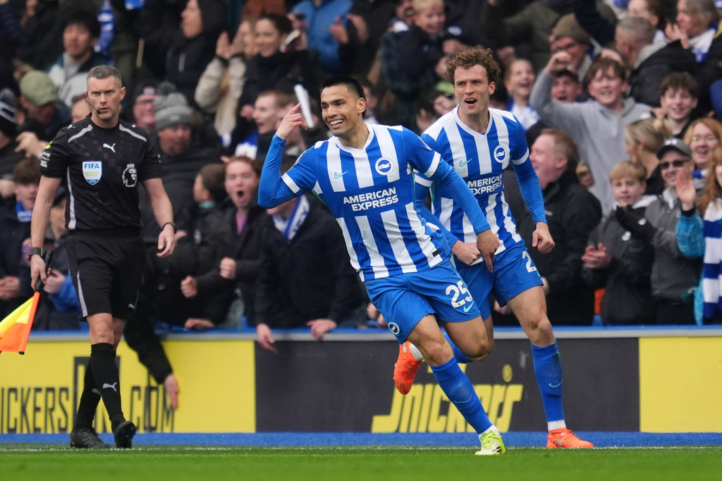 Brighton and Hove Albion's Diego Gomez, left, celebrates scoring during the English Premier League soccer match between Brighton and Hove Albion and Nottingham Forest in Brighton, England, Sunday March 1, 2026. (Adam Davy/PA via AP)
