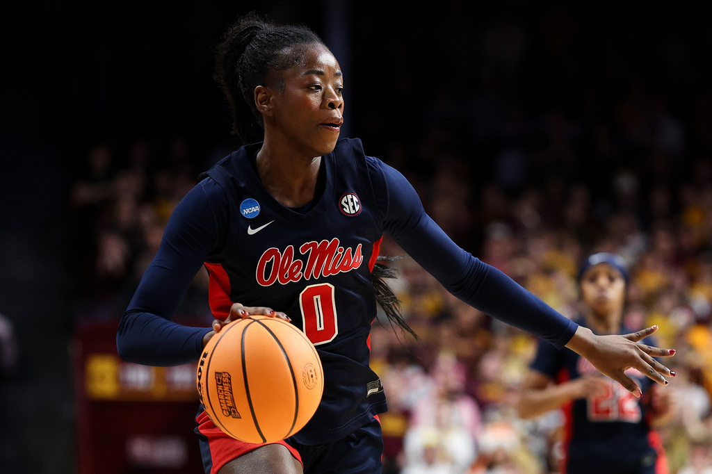 FILE - Mississippi guard Sira Thienou dribbles the ball during the first half in the second round of the NCAA college basketball tournament against Minnesota, March 22, 2026, in Minneapolis. (AP Photo/Matt Krohn, File)