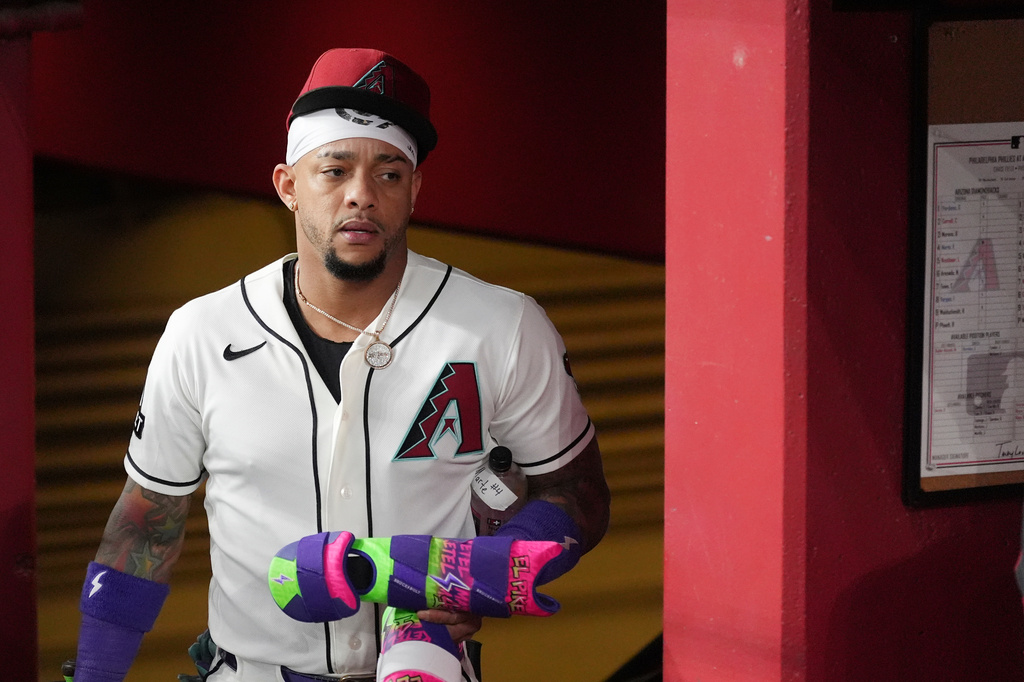 Arizona Diamondbacks designated hitter Ketel Marte walks into the team dugout prior to a baseball game against the Philadelphia Phillies, Monday, Aug. 31, 2026, in Phoenix. (AP Photo/Ross D. Franklin)