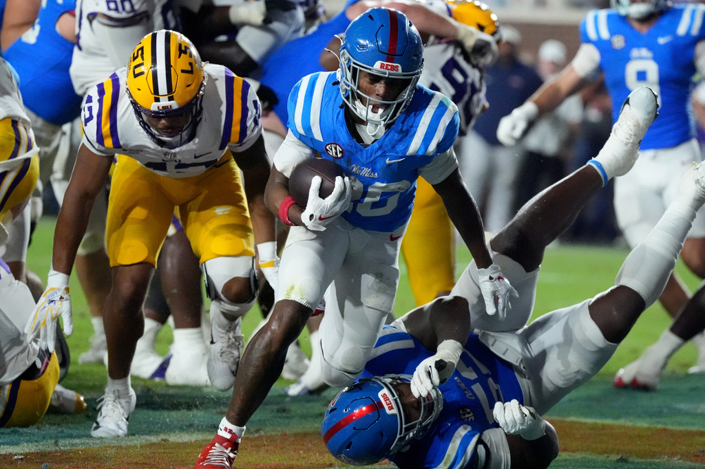 Mississippi running back JT Lindsey (26) runs into the end zone for a two-point conversion during the second half of an NCAA college football game against LSU in Oxford, Miss., Saturday, Sept. 19, 2026. (AP Photo/Rogelio V. Solis)