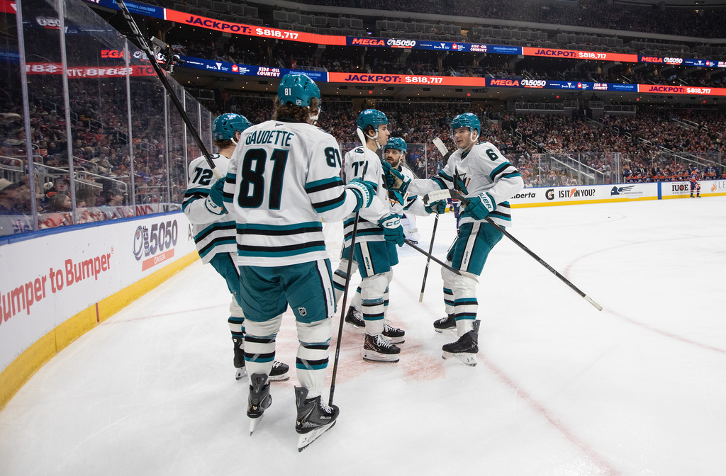 San Jose Sharks players celebrate after a goal against the Edmonton Oilers during first-period NHL hockey game action in Edmonton, Alberta, Thursday, Jan. 29, 2026. (Jason Franson/The Canadian Press via AP)