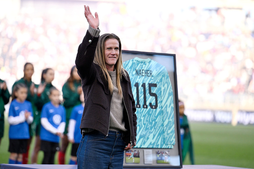 Connecticut native and former United States goalkeeper Alyssa Naeher waves to fans during a ceremony honoring her before an international friendly women's soccer match against Portugal, Sunday, Oct. 26, 2025, in East Hartford, Conn. (AP Photo/Jessica Hill) Connecticut native and former United States goalkeeper Alyssa Naeher waves to fans during a ceremony honoring her before an international friendly women's soccer match against Portugal, Sunday, Oct. 26, 2025, in East Hartford, Conn. (AP Photo/Jessica Hill)
