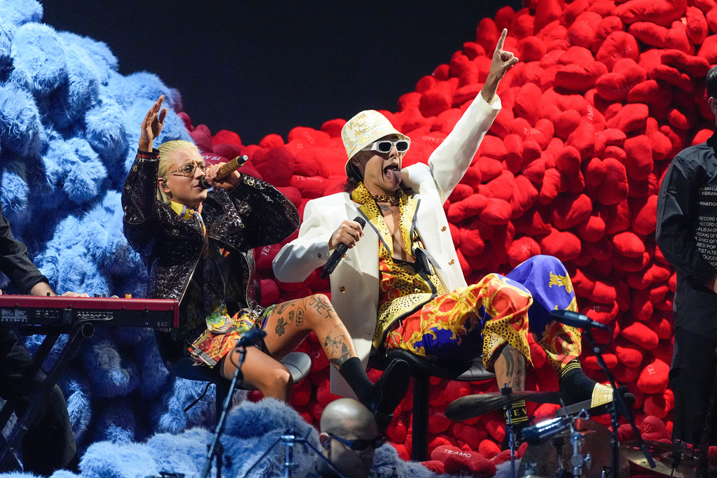 Paco Amoroso, left, and Ca7riel perform during the 2025 Latin Grammys on Thursday, Nov. 13, 2025, at MGM Grand in Las Vegas. (AP Photo/Chris Pizzello)