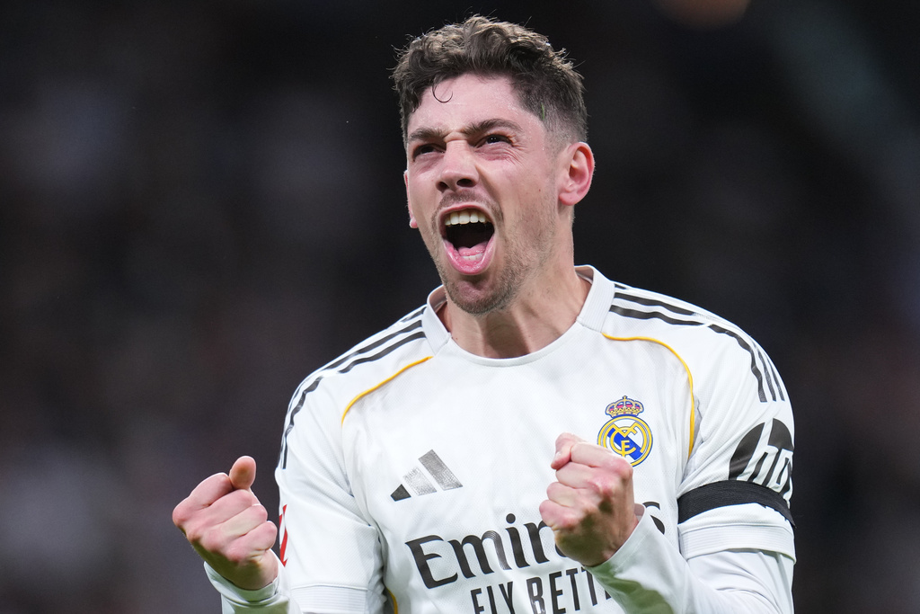 Real Madrid's Federico Valverde celebrates after scoring his side's second goal during a Spanish La Liga soccer match between Real Madrid and Elche CF, in Madrid, Saturday, March 14, 2026. (AP Photo/Manu Fernandez)