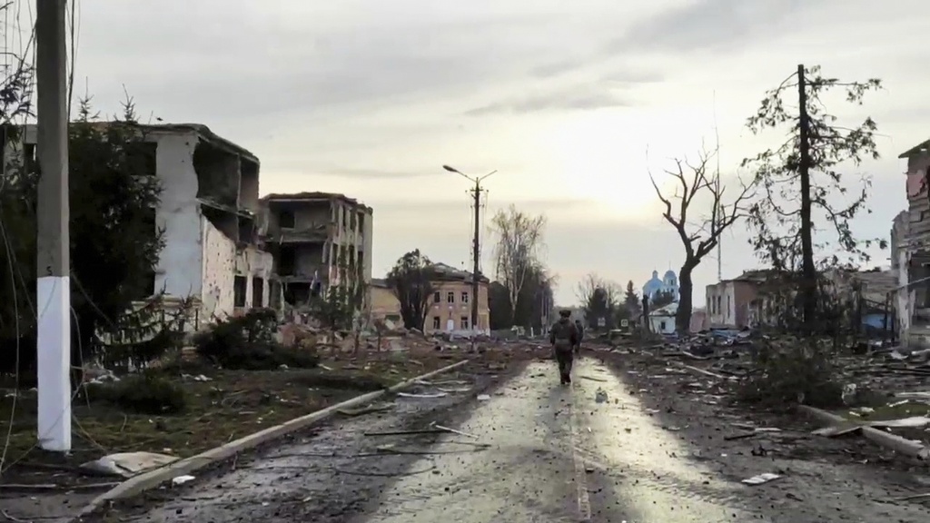 FILE - In this photo taken from video distributed by Russian Defense Ministry Press Service on Thursday, March 13, 2025, a Russian soldier patrols an area in Sudzha, the Kursk region of Russia after it was taken over by Russian troops. (Russian Defense Ministry Press Service via AP, File)