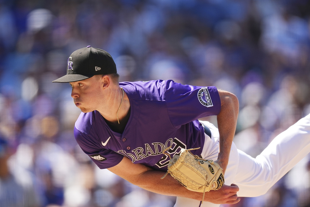 Colorado Rockies starting pitcher Tanner Gordon works against the Chicago Cubs in the sixth inning of a baseball game Sunday, Aug. 31, 2025, in Denver. (AP Photo/David Zalubowski)
