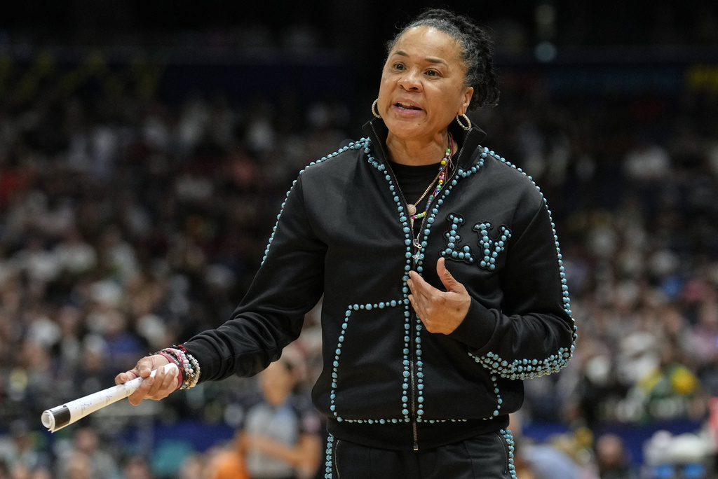 FILE - South Carolina head coach Dawn Staley reacts during the first half of the national championship game against UConn at the Final Four of the women's NCAA college basketball tournament, April 6, 2025, in Tampa, Fla. (AP Photo/Chris O'Meara, File)
