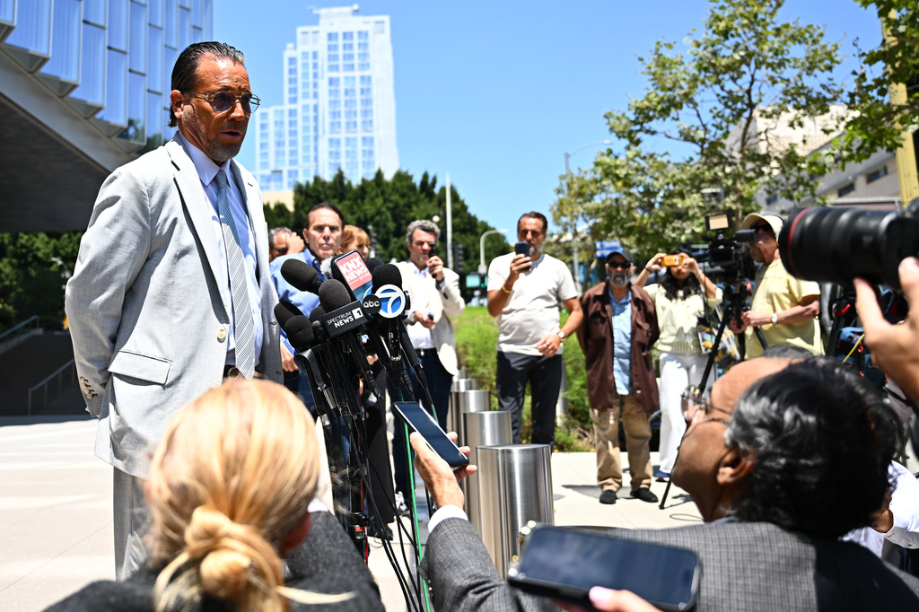 Steve Haney, attorney for Jonathan Rinderknecht, speaks outside federal court after a federal judge declared a mistrial in the arson case against Rinderknecht, who is accused of sparking the deadly 2025 Palisades Fire, on Friday, June 26, 2026, in Los Angeles. (AP Photo/William Liang)