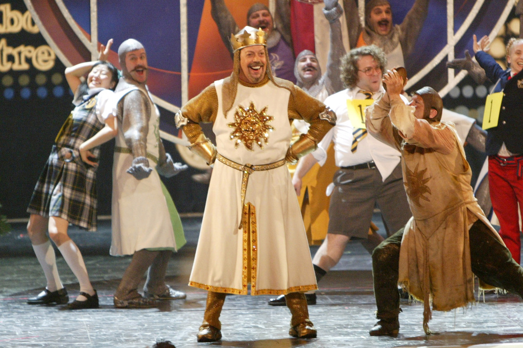 FILE - Tim Curry, center, appears with cast members from nominated Broadway productions at the 2005 Tony Awards at Radio City Music Hall in New York on June 5, 2005. (AP Photo/Kathy Willens, File)