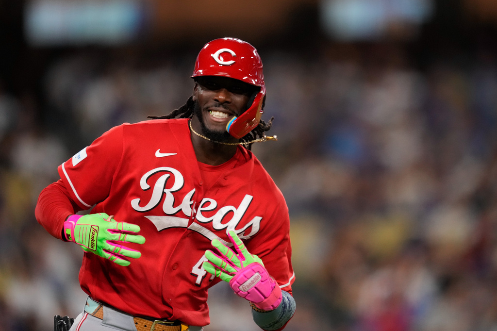 Cincinnati Reds' Elly de la Cruz gestures toward his dugout after hitting a two-run home run during the third inning of a baseball game against the Los Angeles Dodgers, Tuesday, Sept. 8, 2026, in Los Angeles. (AP Photo/Mark J. Terrill)