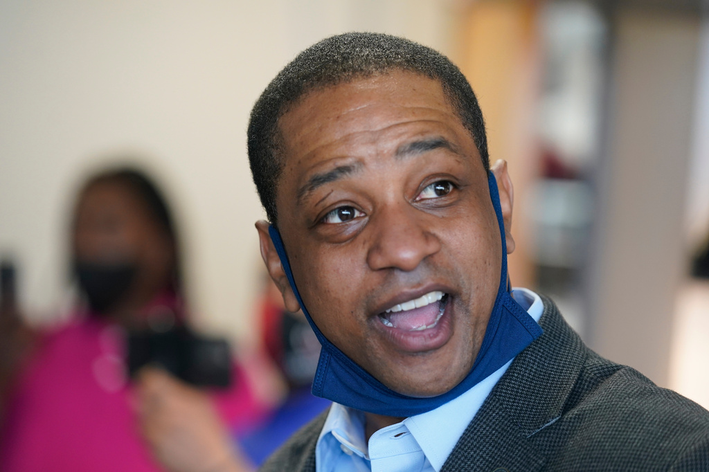 FILE - Virginia Democratic gubernatorial candidate, Lt. Gov. Justin Fairfax, speaks to supporters at Pink Fish restaurant in Hampton, Va., Thursday, April 8, 2021. (AP Photo/Steve Helber, File)