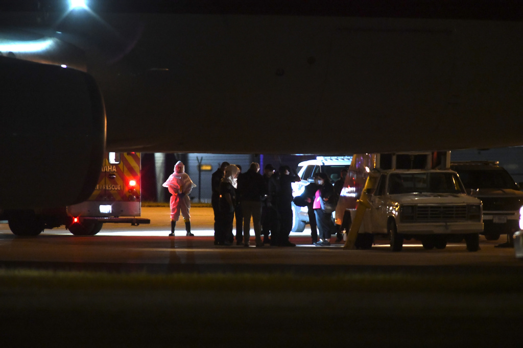 American passengers from the cruise ship, MV Hondius that was stricken with hantavirus, arrived in Omaha, Nebraska after flying from Tenerife, Spain on Monday, May 11, 2026. (AP Photo/Nick Ingram)