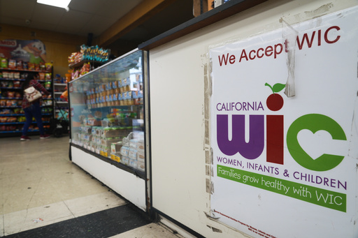 A store post signs accepting WIC payments on Monday, Oct. 27, 2025, in Los Angeles. (AP Photo/Damian Dovarganes) A store post signs accepting WIC payments on Monday, Oct. 27, 2025, in Los Angeles. (AP Photo/Damian Dovarganes)