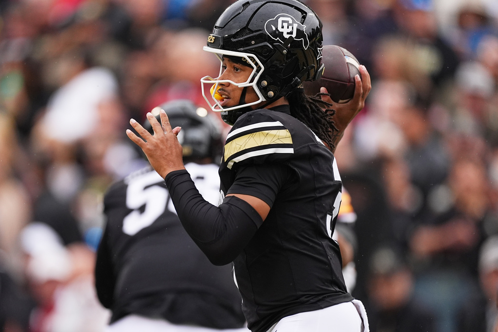 Colorado quarterback Kaidon Salter throws a pass against Iowa State in the first half of an NCAA college football game Saturday, Oct. 11, 2025, in Boulder, Colo. (AP Photo/David Zalubowski)