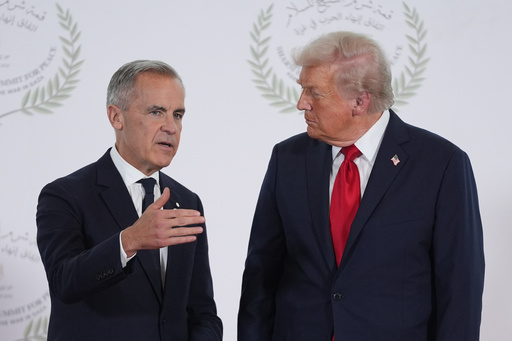 President Donald Trump greets Canada's Prime Minister Mark Carney during a summit to support ending the more than two-year Israel-Hamas war in Gaza after a breakthrough ceasefire deal, Monday, Oct. 13, 2025, in Sharm El Sheikh, Egypt. (AP Photo/Evan Vucci, Pool) President Donald Trump greets Canada's Prime Minister Mark Carney during a summit to support ending the more than two-year Israel-Hamas war in Gaza after a breakthrough ceasefire deal, Monday, Oct. 13, 2025, in Sharm El Sheikh, Egypt. (AP Photo/Evan Vucci, Pool)