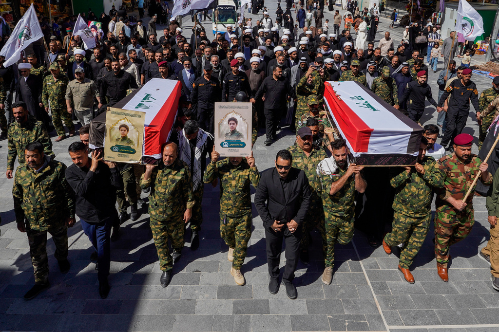 FILE - Members of the Popular Mobilization Forces attend a funeral for colleagues who were killed in a U.S. airstrike in Anbar, in Najaf, Iraq, Wednesday, April 1, 2026. (AP Photo/Anmar Khalil, File)