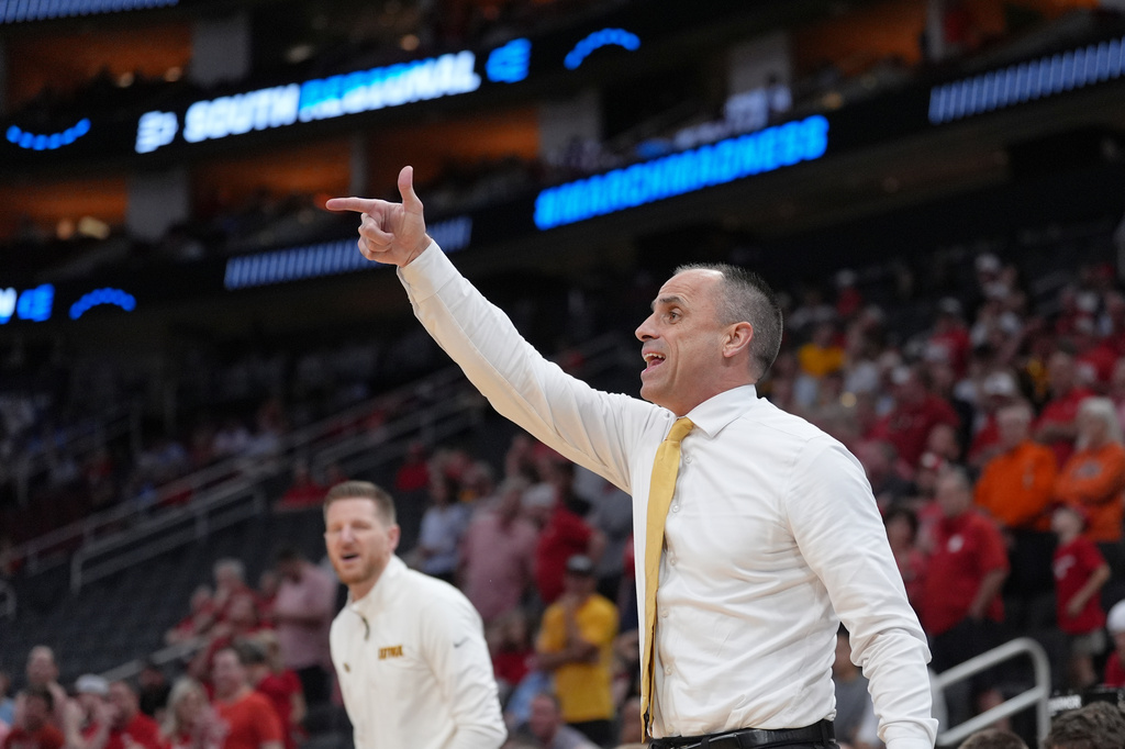 Iowa head coach Ben McCollum directs his players during the first half against Nebraska in the Sweet 16 of the NCAA college basketball tournament Thursday, March 26, 2026, in Houston. (AP Photo/Eric Gay)