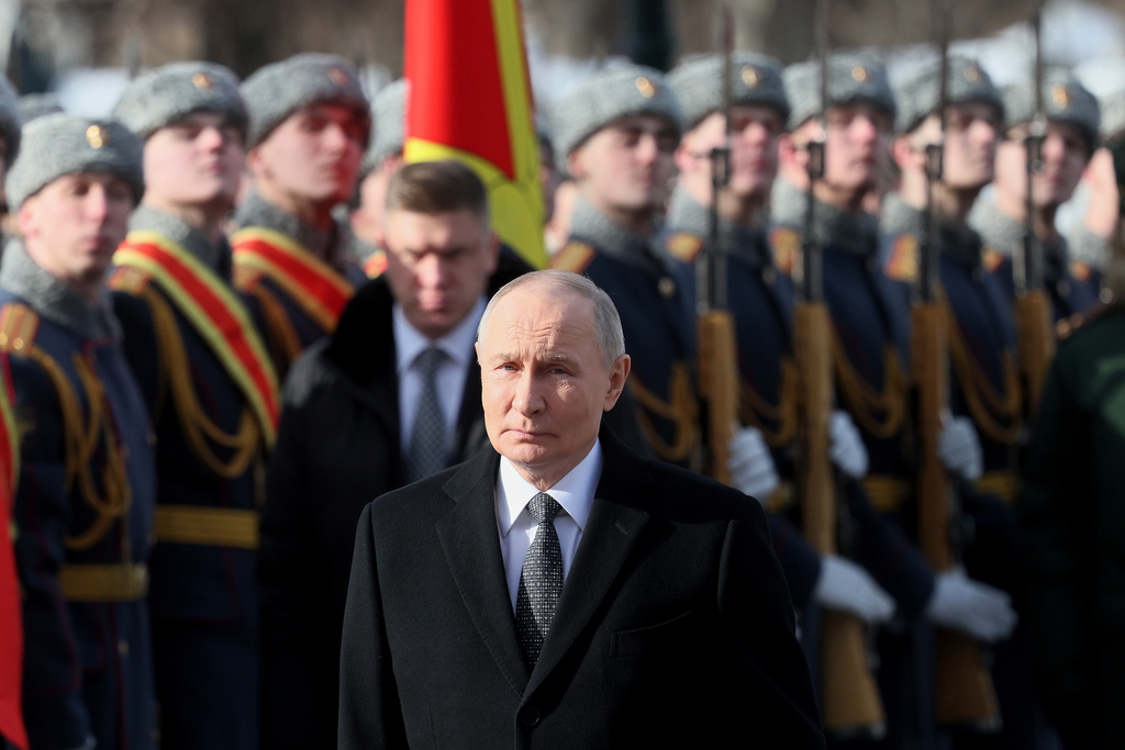FILE - Russian President Vladimir Putin attends a wreath-laying ceremony at the Tomb of the Unknown Soldier near the Kremlin Wall during the national celebration of "Defender of the Fatherland Day" in Moscow, Russia, Feb. 23, 2026. (Maxim Shipenkov/Pool Photo via AP, File)