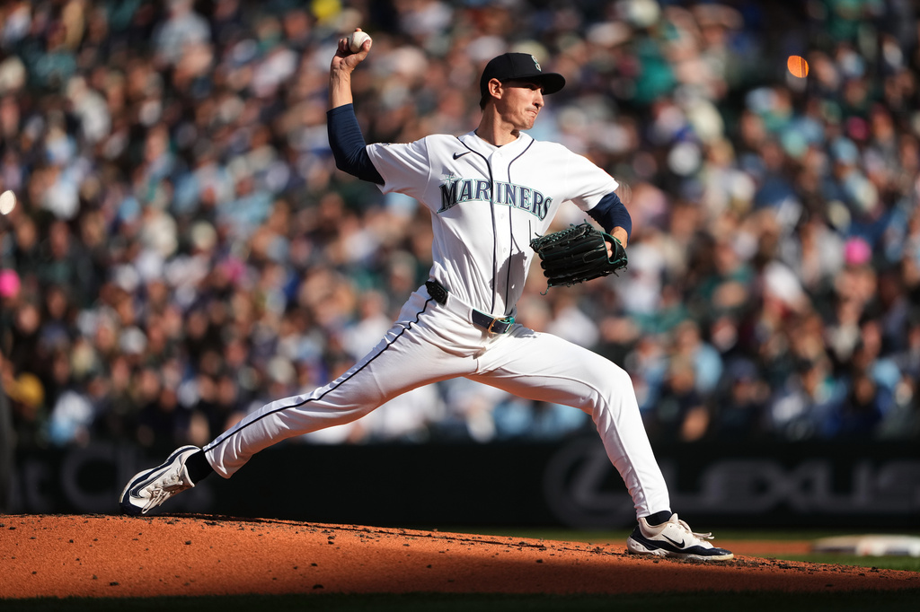 Seattle Mariners starting pitcher George Kirby throws against the Texas Rangers during the second inning of a baseball game, Saturday, April 18, 2026, in Seattle. (AP Photo/Lindsey Wasson)