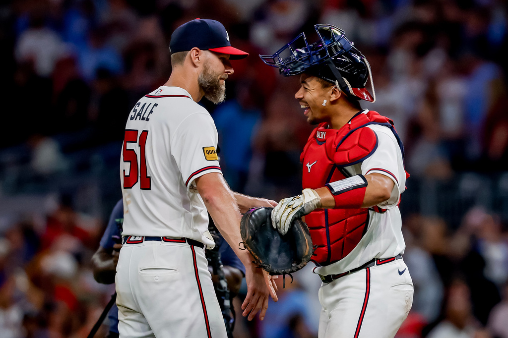 Atlanta Braves pitcher Chris Sale (51) celebrates with catcher Drake Baldwin, right after winning a baseball game shutout against the Los Angeles Dodgers, Thursday, Aug. 27, 2026, in Atlanta. (AP Photo/Erik S. Lesser)