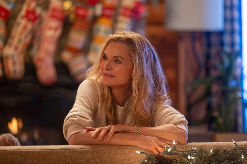 This image released by Amazon Prime shows Michelle Pfeiffer in a scene from "Oh. What. Fun." (Alisha Wetherill/Amazon Prime via AP)