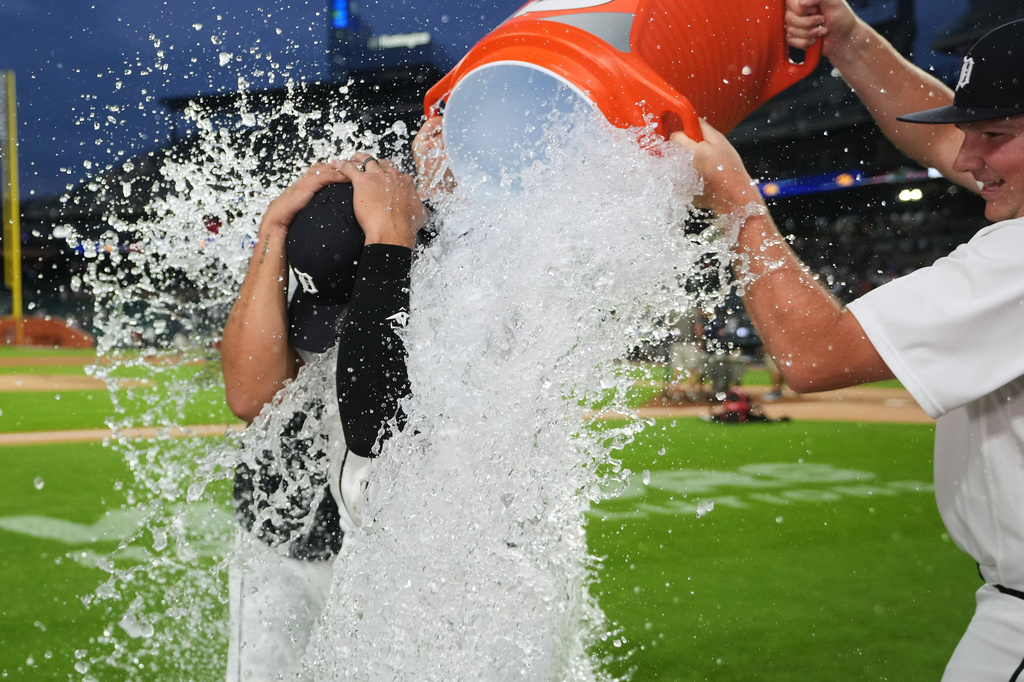 Detroit Tigers' Eduardo Valencia is doused by water after a baseball game against the Athletics Thursday, July 9, 2026, in Detroit. (AP Photo/Paul Sancya)