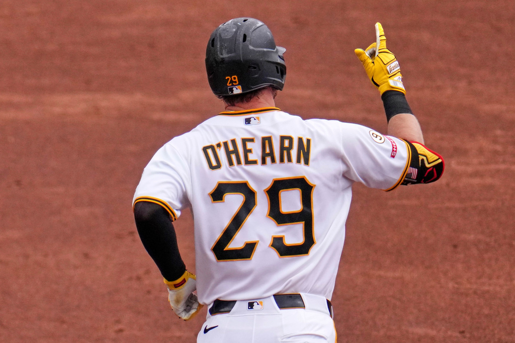 Pittsburgh Pirates' Ryan O'Hearn rounds the bases after hitting a grand slam off Chicago Cubs pitcher Jameson Taillon during the third inning of a baseball game in Pittsburgh, Sunday, July 26, 2026. (AP Photo/Gene J. Puskar)