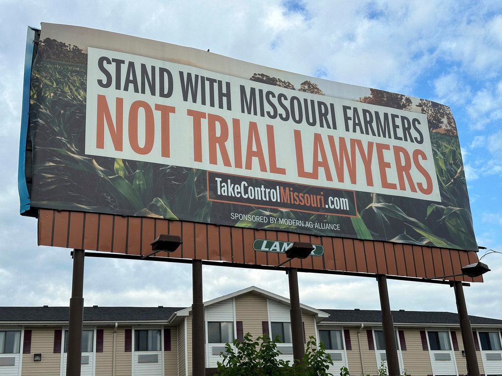FILE - A billboard supporting legislation that would provide legal protection to manufacturers of pesticides is displayed, May 13, 2024, in Jefferson City, Mo. (AP Photo/David A. Lieb, File)