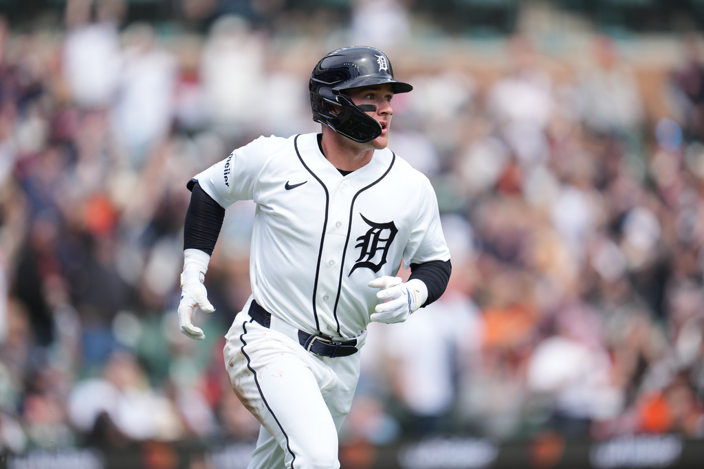 Detroit Tigers' Kevin McGonigle watches his home run against the Miami Marlins during the fifth inning of a baseball game Sunday, April 12, 2026, in Detroit. (AP Photo/Paul Sancya)