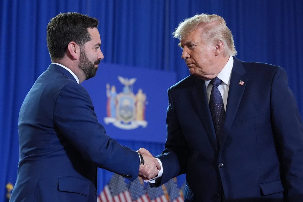 FILE - President Donald Trump shakes hands with Rep. Mike Lawler, R-N.Y., at Rockland Community College, May 22, 2026, in Suffern, N.Y. (AP Photo/Alex Brandon, File)