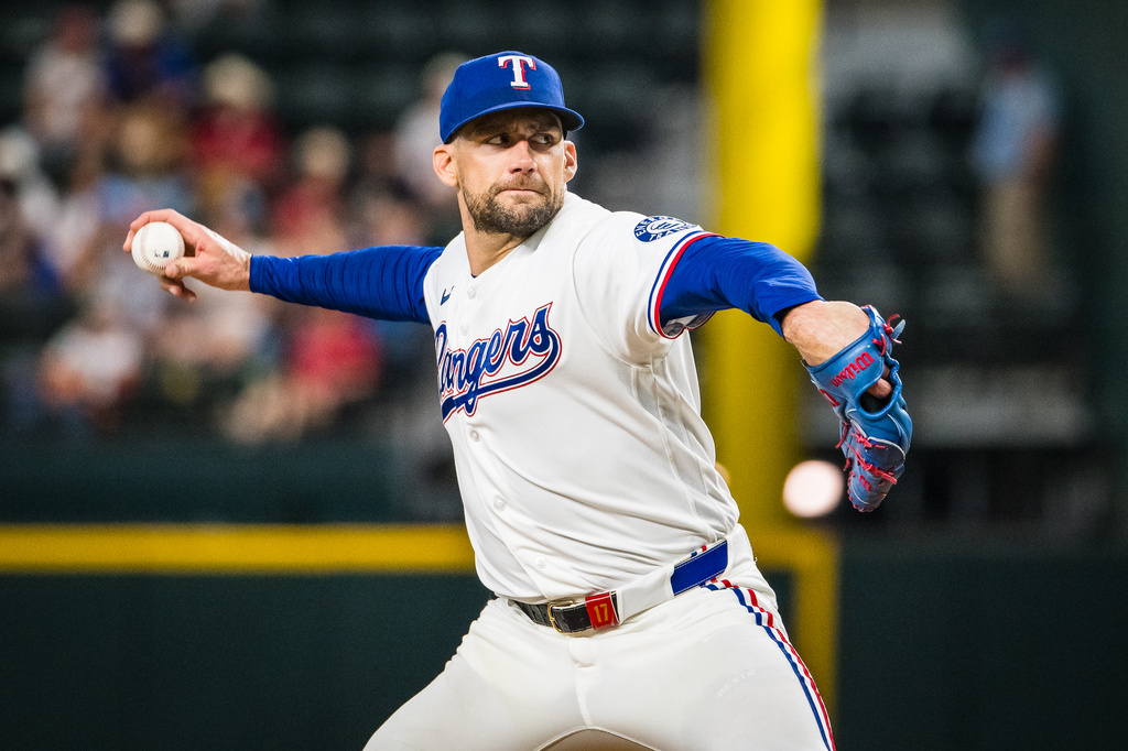 Texas Rangers' Nathan Eovaldi pitches during the first inning of a baseball game against the Houston Astros, Thursday, May 28, 2026, Arlington, Texas. (AP Photo/Jessica Tobias)
