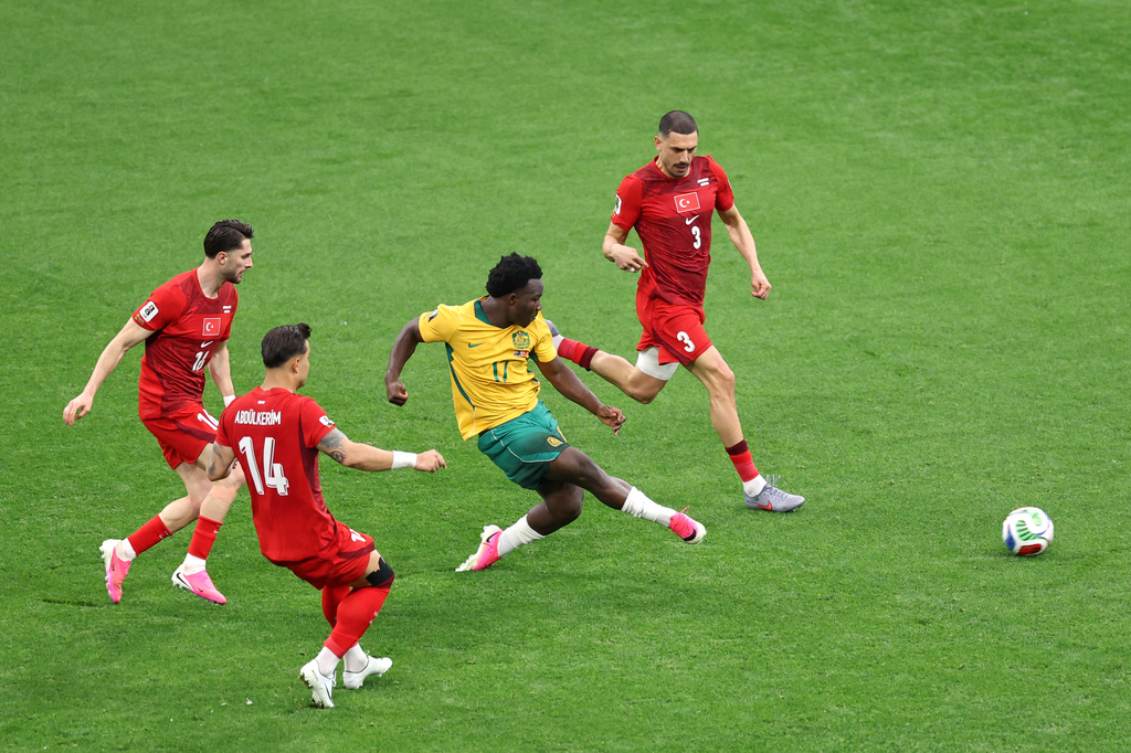 Australia's Nestory Irankunda (17) sends the ball into the net for the first goal of the match during the World Cup Group D soccer match between Australia and Turkey in Vancouver, Canada, Saturday, June 13, 2026. (AP Photo/Emma Peterson)