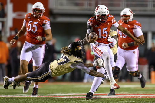 Utah quarterback Byrd Ficklin (15) jumps to avoid a tackle by Colorado linebacker Martavius French (37) during the first half an NCAA college football game, Saturday, Oct. 25, 2025, in Salt Lake City, Utah. (AP Photo/Tyler Tate) Utah quarterback Byrd Ficklin (15) jumps to avoid a tackle by Colorado linebacker Martavius French (37) during the first half an NCAA college football game, Saturday, Oct. 25, 2025, in Salt Lake City, Utah. (AP Photo/Tyler Tate)