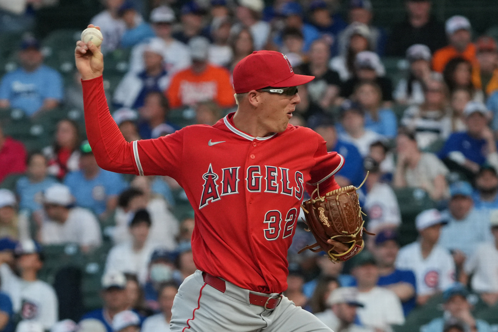 Los Angeles Angels pitcher Ryan Johnson (32) pitches against the Chicago Cubs during the first inning in a baseball game, Monday, March 30, 2026, in Chicago. (AP Photo/David Banks)