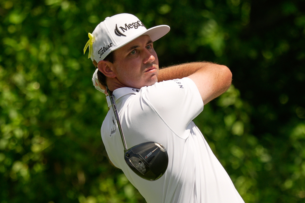 J.T. Poston hits from the 15th tee during the second round of the Memorial golf tournament in Dublin, Ohio, Friday, June 5, 2026. (AP Photo/Sue Ogrocki)